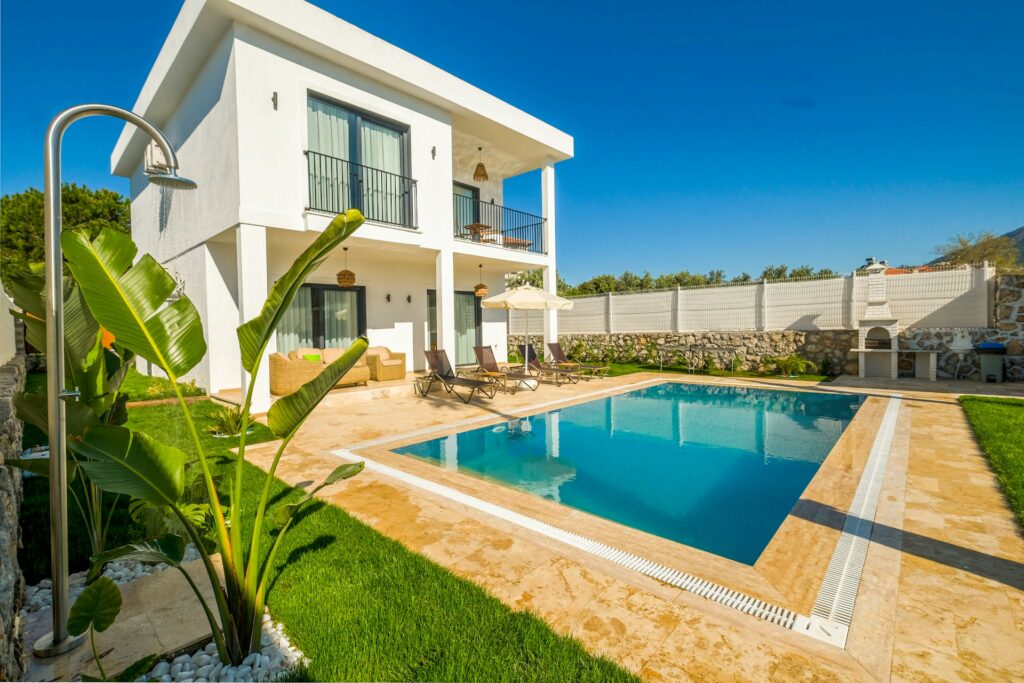 The Easiest Way to Keep Your Pool Clean All Season 1 faruk-tokluoglu-7ugCvlbjv-E-unsplash