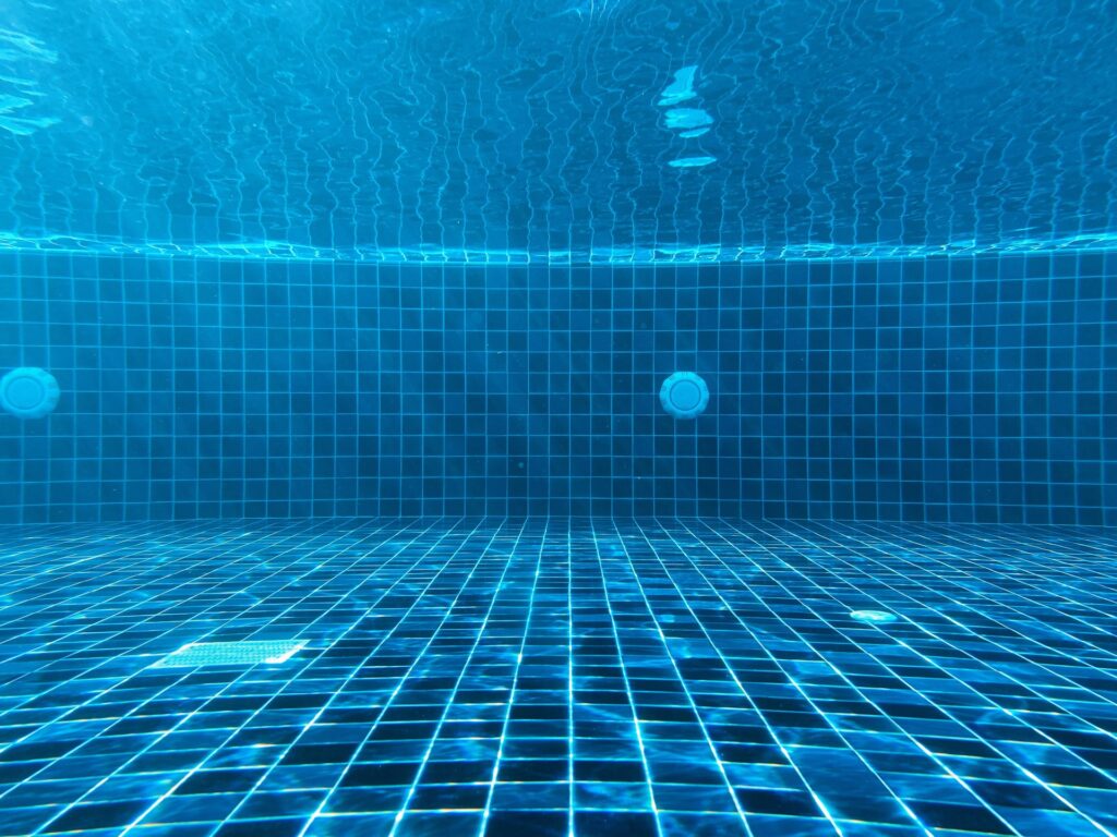 clark tai nq18MYhxdGs unsplash How to Keep Your Pool Crystal Clear All Summer
