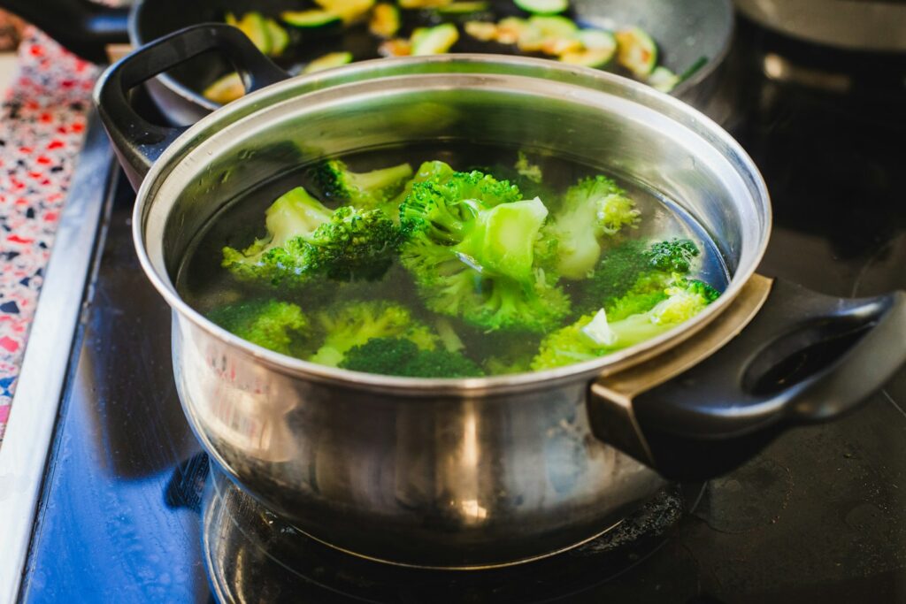How to Properly Freeze Food Without Ruining the Taste or Texture 9 Broccoli blanching in a pot of boiling water